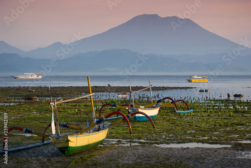 Mt. Agung Seen From the Shores of Nusa Lembongan, Bali, Indonesia. Standing majestically on the eastern seaboard of Bali is the island’s highest mountain and is located in the district of Karangasem.  photo