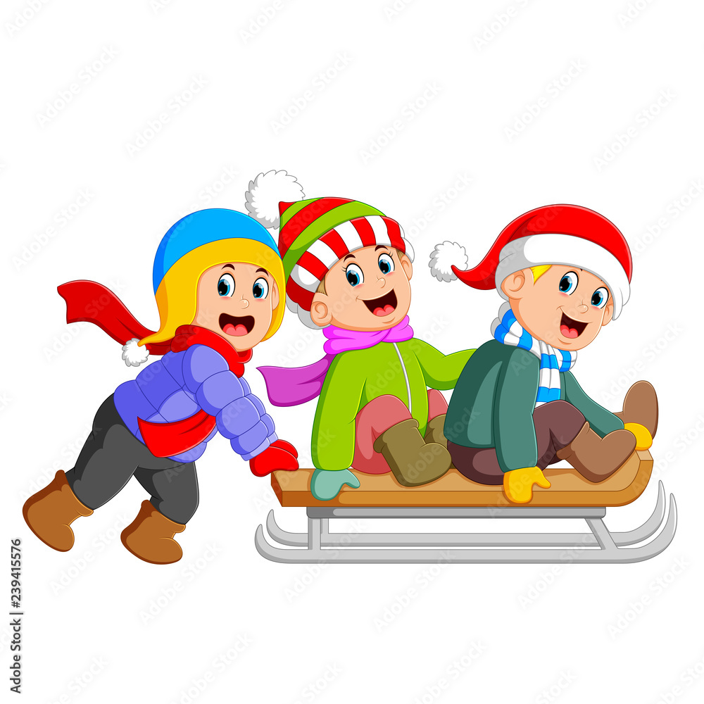 an excited boys are playing on the ice board cart and some of them pulls it an excited boys are playing on the ice board cart and some of them pulls it