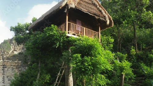 Tree houses on top of beautiful limestome cliff