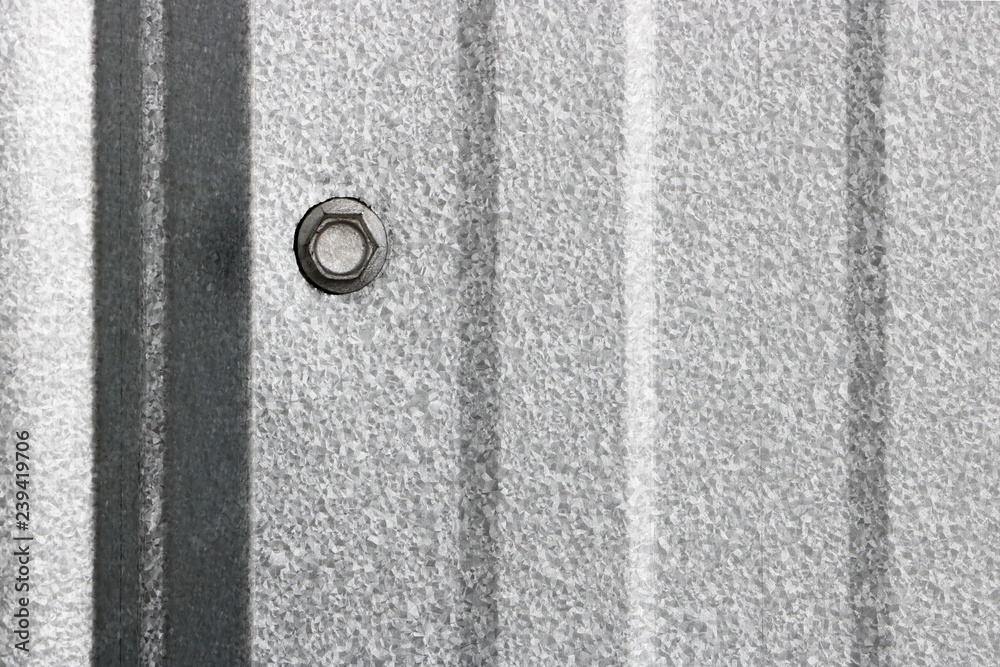 Texture of fitting bolt on wall metal sheet, abstract background Texture of fitting bolt on wall metal sheet, abstract background