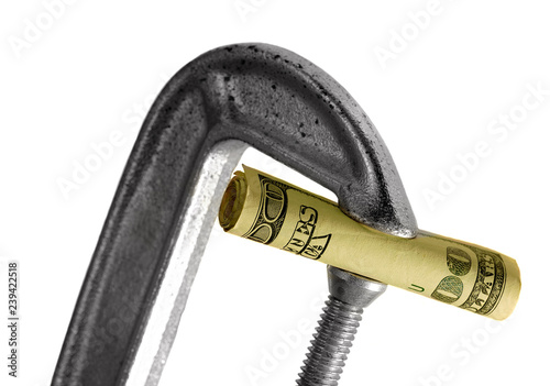A hundred dollar bill in a Vice Clamp