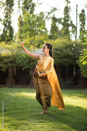 Beautiful Woman wearing typical Thai dress