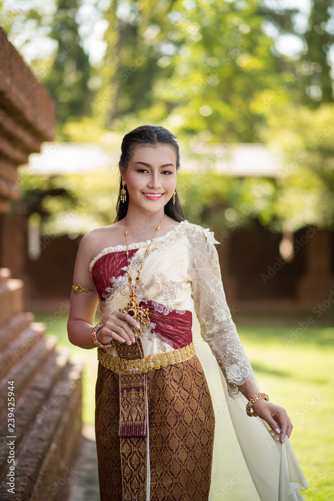 Beautiful Woman wearing typical Thai dress