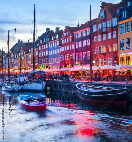 People Nyhavn harbor embankment, Sopenhagen
