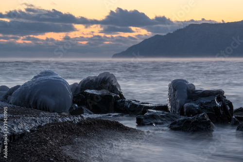 The icy stones on the shore of Lake Baikal