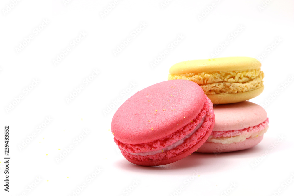 Cake macaron or macaroon isolated on white background from above, colorful almond cookies, pastel colors, vintage card, front view Cake macaron or macaroon isolated on white background from above, colorful almond cookies, pastel colors, vintage card, front view
