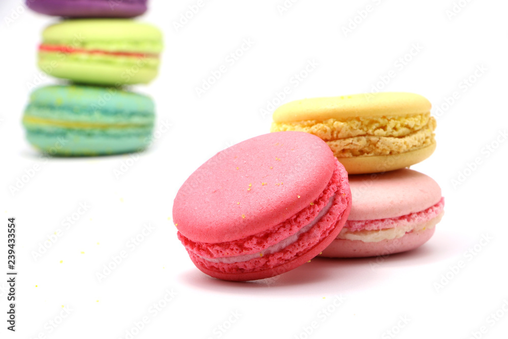 Cake macaron or macaroon isolated on white background from above, colorful almond cookies, pastel colors, vintage card, front view Cake macaron or macaroon isolated on white background from above, colorful almond cookies, pastel colors, vintage card, front view