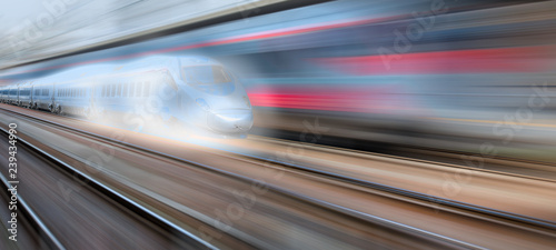 High speed train in motion on the railway station