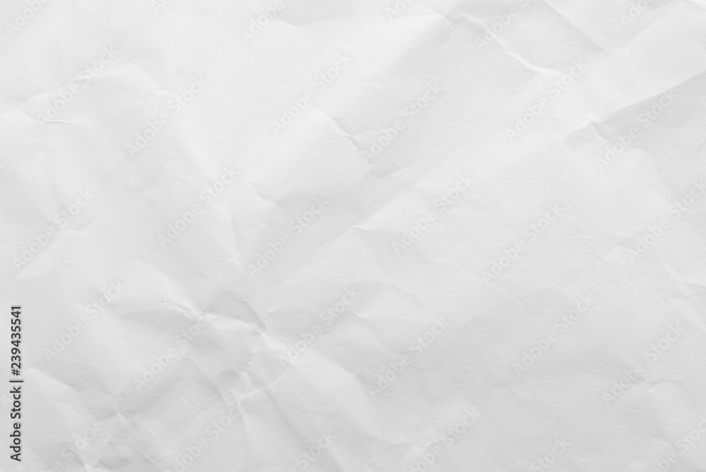 White crumpled paper texture background. Close-up. White crumpled paper texture background. Close-up.