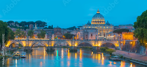 Sant'Angelo bridge and St Peter's Basilica at sunset - Rome, italy
