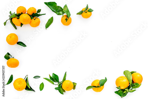 Fototapeta Naklejka Na Ścianę i Meble -  pile of tangerines for New Year and Christmas celebration on white background top view mock up