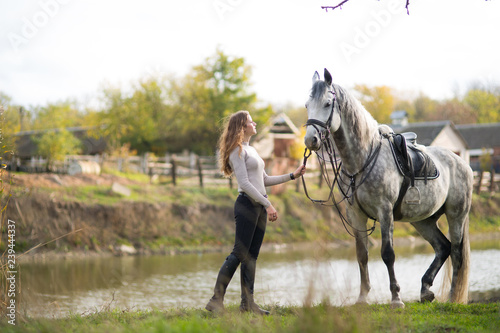 woman with a horse for a walk