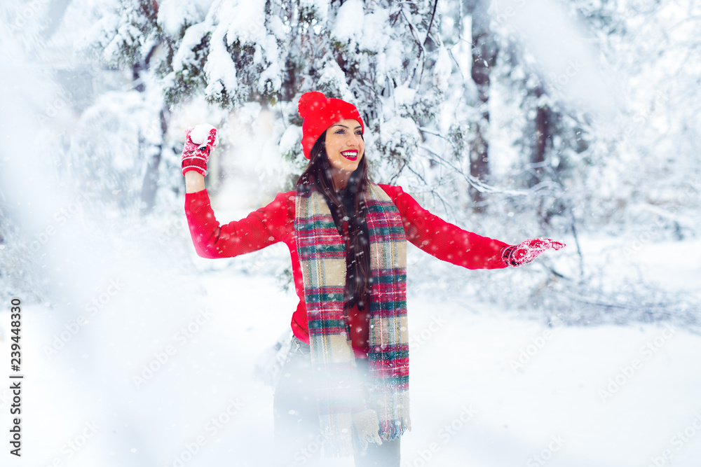 Beautiful woman standing among snowy trees in winter forest - Image Beautiful woman standing among snowy trees in winter forest - Image