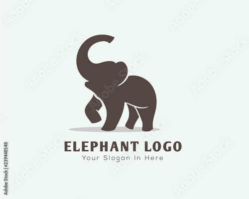 Stand elephant with roaring logo design inspiration photo