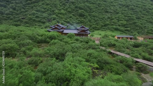 Great drone shot towards Tampak temple in Huanglong valley photo