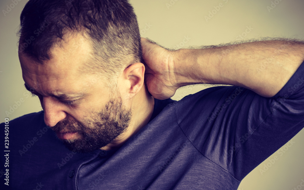 Obraz premium Man having neck ache