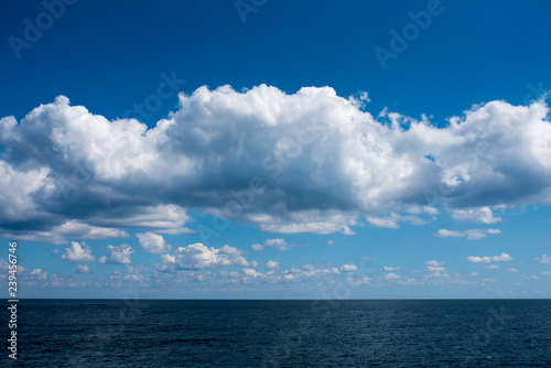 Sea and wonderful clouds. It was photographed on the East Coast of Korea on September 25  2018. Due to the clear weather  the boundary between the sea and the sky is clear.