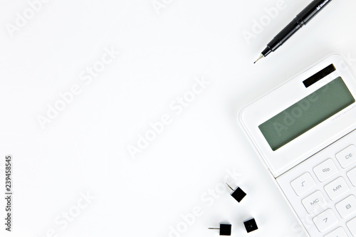 notebook and pen on white background
