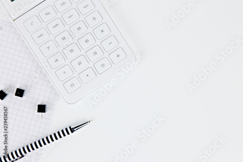 notebook and pen on white background