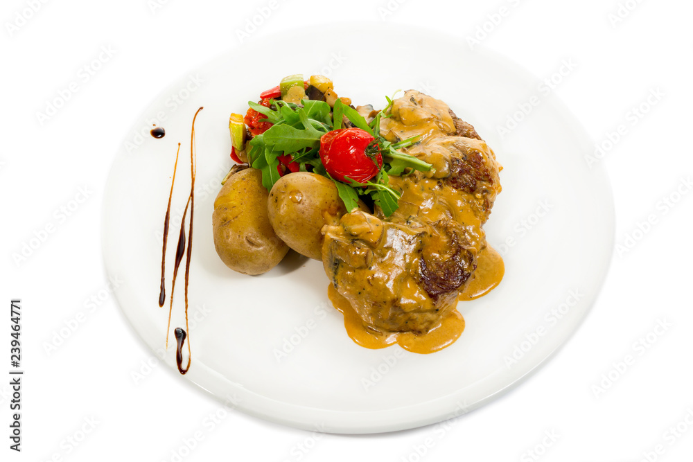 Pork Medallions with Potato and Mushrooms isolated on white. Pork Medallions with Potato and Mushrooms isolated on white.