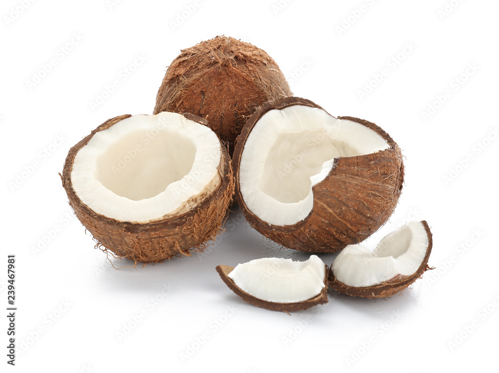 Ripe coconuts on white background