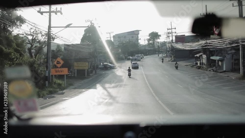 Driving through traffic in PhuketThailand photo