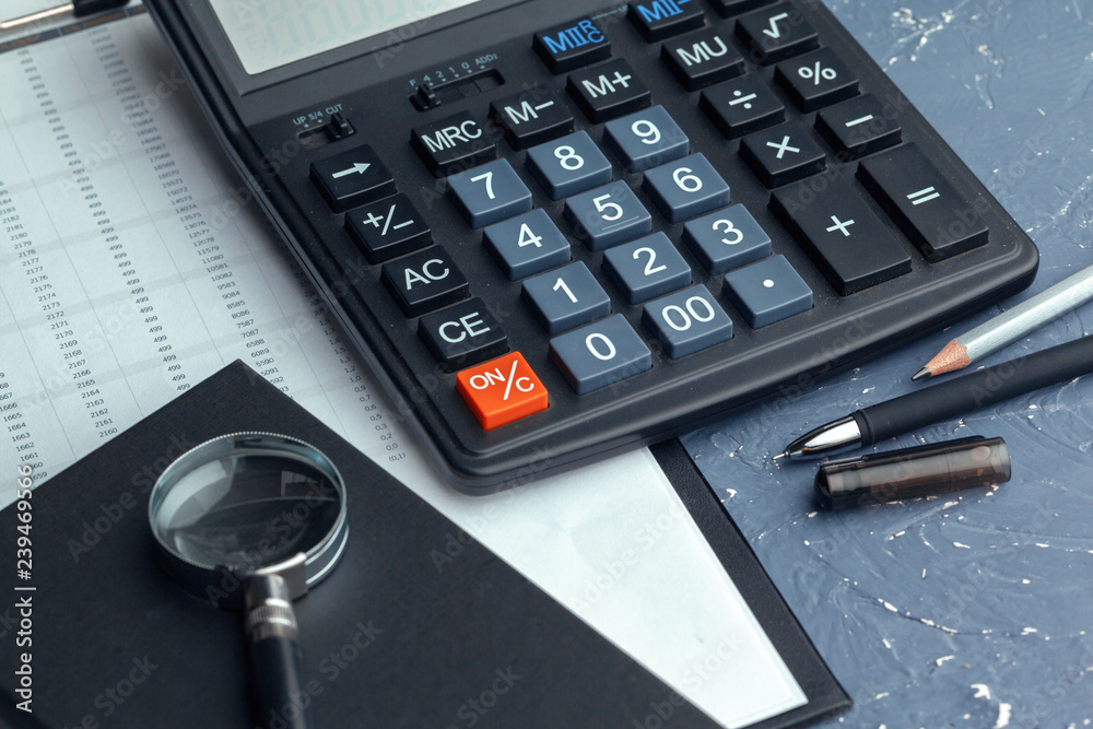 Business still life with calculator on table in office. Business still life with calculator on table in office.
