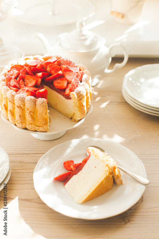 French Fresh Strawberry charlotte cake with teapot French Fresh Strawberry charlotte cake with teapot