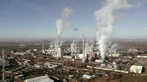 Paper mill. Epic drone shot. Camera panning to left. photo