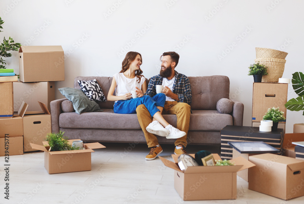 © JenkoAtaman - happy young married couple moves to new apartment © JenkoAtaman - happy young married couple moves to new apartment