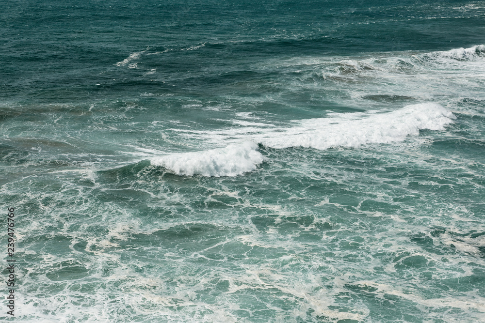 Fototapeta premium Beautiful view of the water surface with the waves of the Atlantic Ocean.