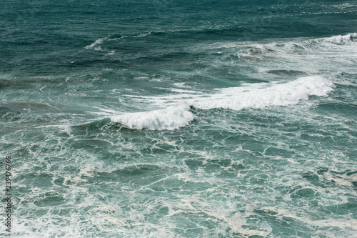 Beautiful view of the water surface with the waves of the Atlantic Ocean.