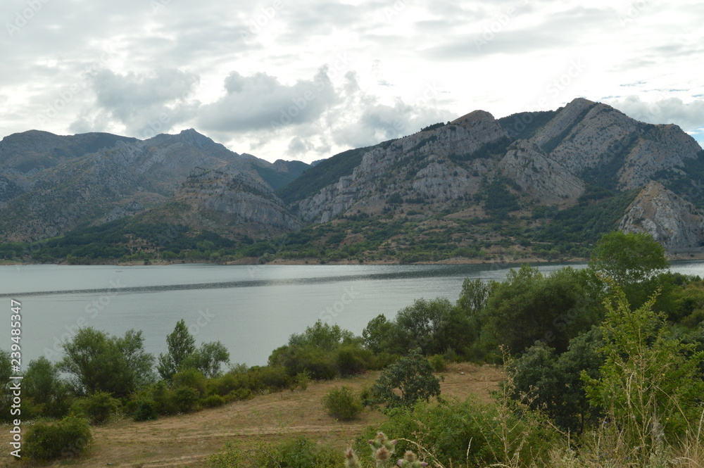 Fototapeta premium Wonderful Views On A Cloudy Day Of The Barrios De Luna Reservoir. July 29, 2015. Landscapes, Nature, Travel. Barrios De Luna, Leon, Spain.
