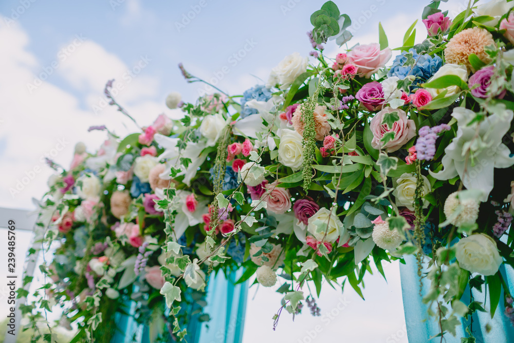 Floral decorations for wedding ceremony. Wedding arch with beautiful flowers. Floral decorations for wedding ceremony. Wedding arch with beautiful flowers.