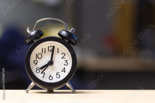  Black Alarm Clock on desk table