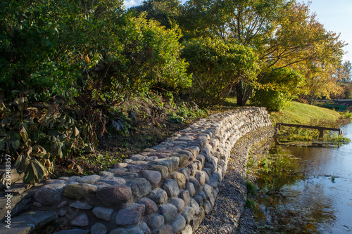 Cottage garden with stone stairs and retaining wall