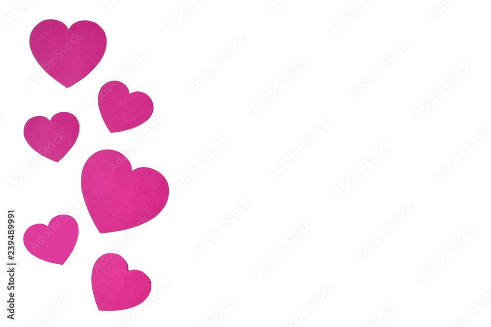 Isolated pink paper hearts in line sideways in form of a decorative frame on a white background.