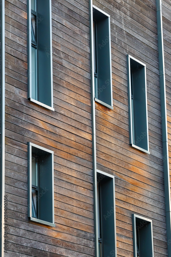 modern wooden facade of the building, close up