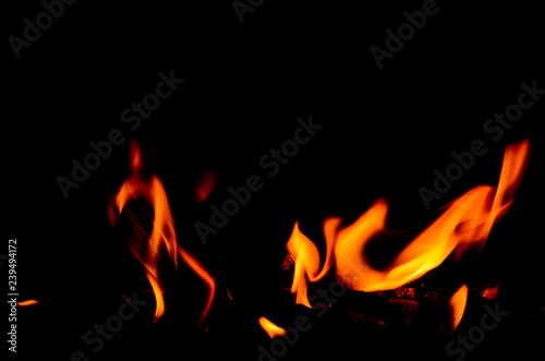 Warm dancing flames on a black background.
