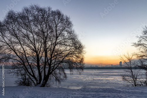 winter sunrise at strogino floodplain. moscow, russia