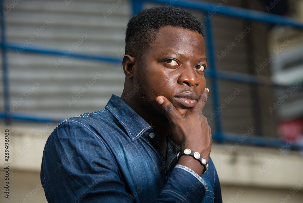 close up of young african man.