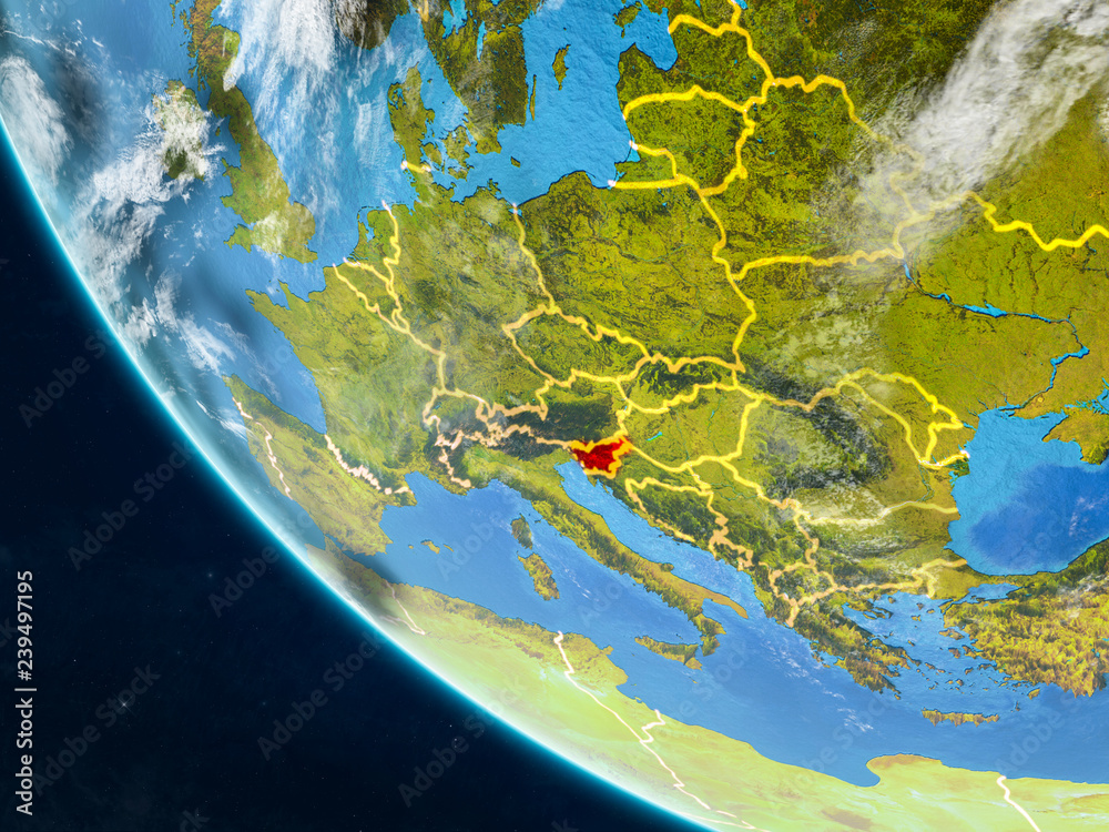 Slovenia on planet Earth from space with country borders. Very fine detail of planet surface and clouds.