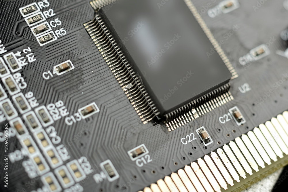 Close-up of electronic chip in desktop computer motherboard circuit. Close-up of electronic chip in desktop computer motherboard circuit.