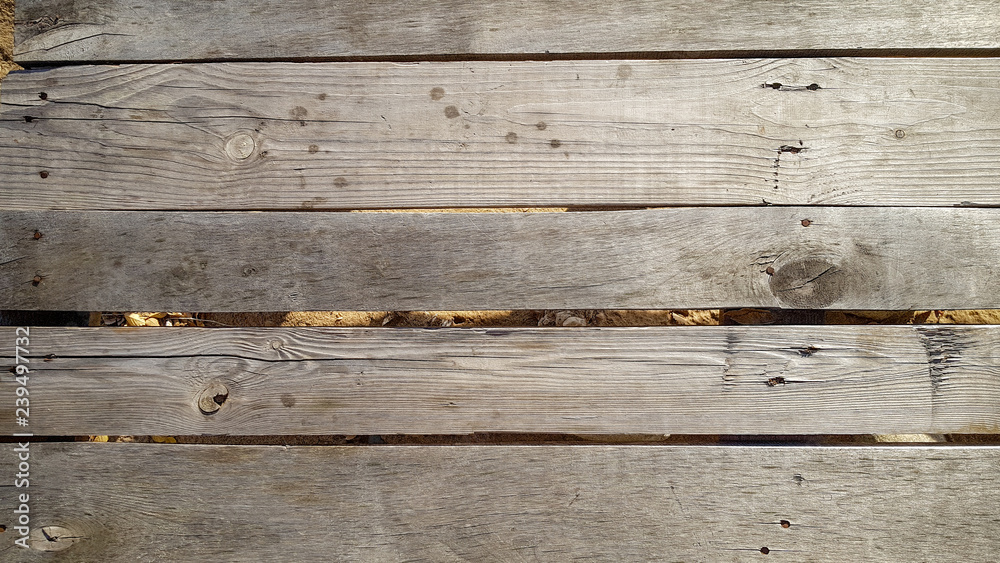 Peeled and faded plank wooden texture wallpaper. Peeled and faded plank wooden texture wallpaper.