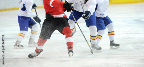 close-up with the puck during the game. Hockey, winter sport