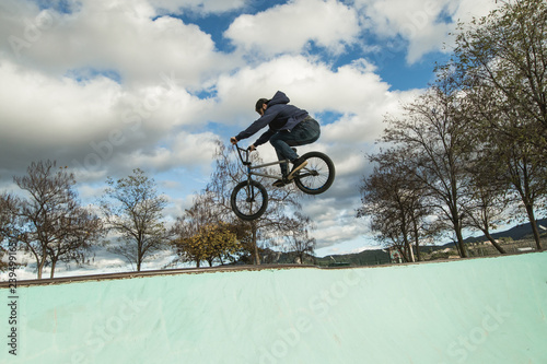 BMX rider doing tricks. Urban extreme sports