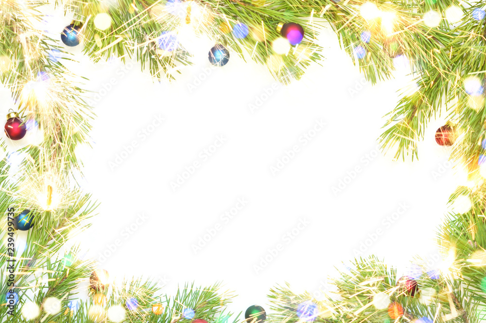 Christmas frame made from pine branch and ornaments on white background. Christmas frame made from pine branch and ornaments on white background.
