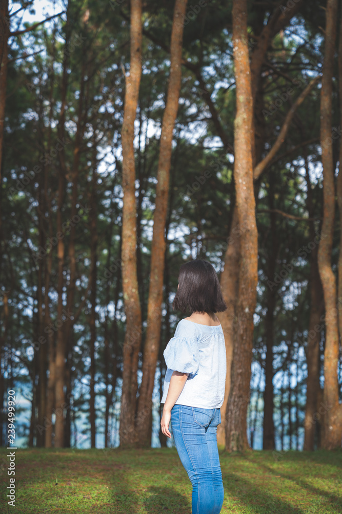 Happy young cute asian Japanese girl hipster backpack women travelling looking at beautiful sky mountains scenery view Happy young cute asian Japanese girl hipster backpack women travelling looking at beautiful sky mountains scenery view