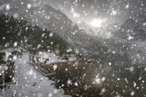Heavy snowfall at Eye of the Sea lake in Tatra mountains, Poland