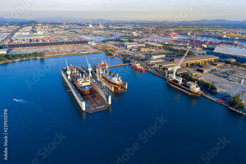 TOP VIEW  Aerial View of Industrial port with containers ship  business logistics concept  Aerial view from drone.